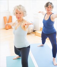 Two senior women exercising. Photo : Daniel Grill