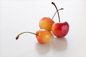 Fresh cherries on white background.