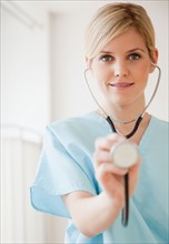 Young nurse with stethoscope. Photo: Jamie Grill