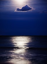 USA, New York, Queens, Rockaway Beach, Landscape with sea and moonlight at night. Photo: Jamie