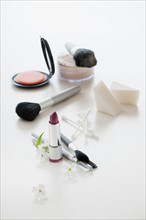 Various cosmetics on white background.