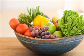 Bowl of organic fruit and vegetables.