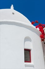 Greece, Cyclades Islands, Mykonos, Traditional building window.