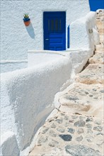 Greece, Cyclades Islands, Santorini, Oia, Steps outside house.