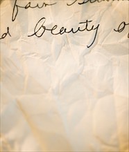 Close up of antique love letter on parchment . Photo : Jamie Grill