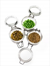 Studio shot of jars with Mixed Seeds on white background. Photo: David Arky