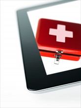 Studio shot of first aid kit on digital tablet. Photo: David Arky
