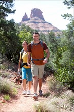 Man and woman hiking outdoors