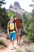 Man and woman hiking outdoors