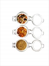 Studio shot of jars with Mixed Seeds on white background. Photo: David Arky