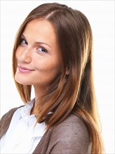 Close-up portrait of happy business woman smiling. Photo : momentimages