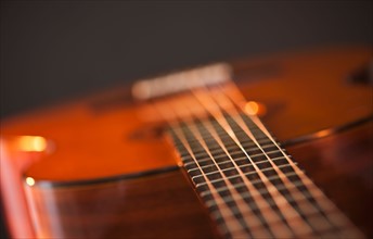 Close up of acoustic guitar. Photo : Daniel Grill