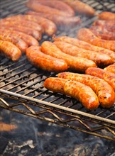 Sausages on barbeque.