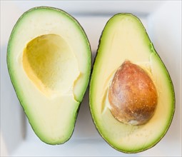 Close up of halves of avocado. Photo : Jamie Grill