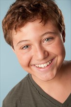 Studio portrait of boy (12-13). Photo : Rob Lewine