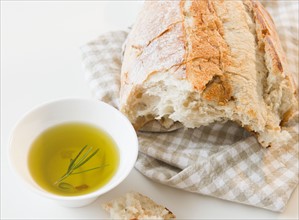 Close up of bread and olive oil on table. Photo: Jamie Grill