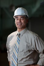 Portrait of male technician wearing hardhat. Photo: db2stock