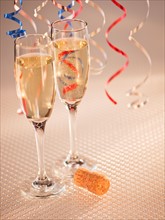 Flutes with champagne, close-up. Photo: Daniel Grill