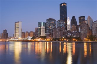 USA, New York State, New York City, Manhattan, Skyscrapers of Manhattan at dusk. Photo : fotog
