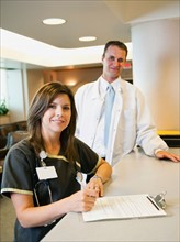 Portrait of confident female nurse and doctor.