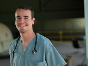 Healthcare worker smiling at camera. Photo: db2stock