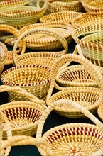 USA, South Carolina, Charleston, Close up of sweetgrass baskets on street market.