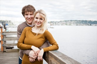 USA, Washington, Seattle, Portrait of young couple on pier. Photo : Take A Pix Media