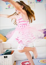 Girl ( 6-7) dancing in her room. Photo : Jamie Grill