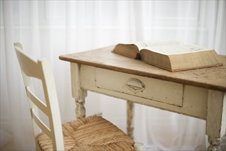 Antique table and book.