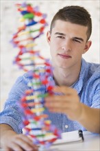 Teenage student (16-17) learning genetics.