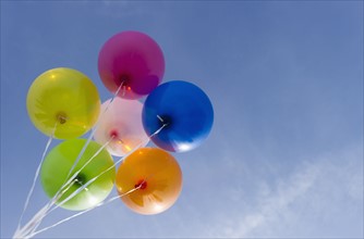 Balloons against blue sky.