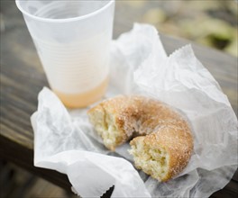 Close up donut and apple cider. Photo: Jamie Grill