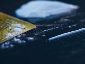Close up of cocaine and credit card on black background. Photo: Daniel Grill