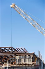 USA, Long Island, Crane on construction site. Photo: fotog