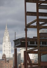 USA, New York State, New York City, Construction site and Chrysler building in background. Photo: