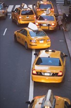 USA, New York City, Manhattan, Yellow cabs on 42nd street. Photo: fotog