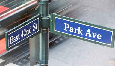 USA, New York City, Manhattan, Road direction sign at crossroads of 42nd Street and Park Avenue.