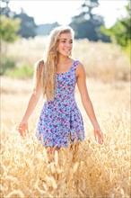 Outdoor portrait of happy teenage girl (16-17). Photo: Take A Pix Media
