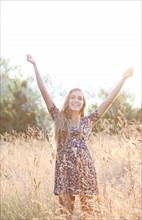 Outdoor portrait of happy teenage girl (16-17) . Photo: Take A Pix Media