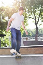 Young man skateboarding. Photo: Take A Pix Media