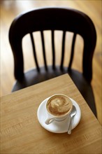 Cup of coffee on table. Photo : John Kelly