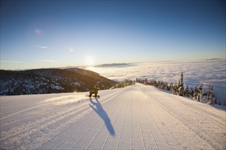 USA, Montana, Whitefish, Tourist on ski slope. Photo: Noah Clayton