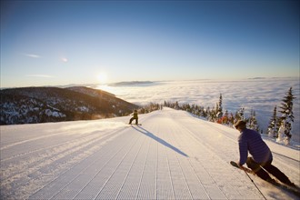 USA, Montana, Whitefish, Tourists on ski slope. Photo: Noah Clayton