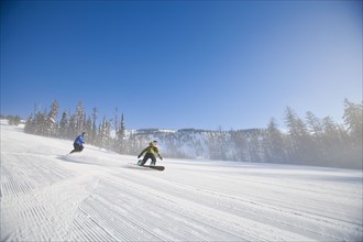USA, Montana, Whitefish, Tourists on ski slope. Photo : Noah Clayton