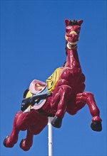 Mexico, Carousel painted horse used as building decor. Photo: DKAR Images