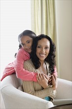 Portrait of Mother and Daughter (10-11) at home. Photo: Rob Lewine