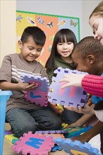 Children (6-7) learning in classroom. Photo : Rob Lewine