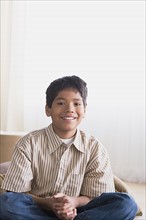 Portrait of smiling boy (10-11). Photo : Rob Lewine