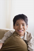 Portrait of smiling boy (10-11). Photo : Rob Lewine