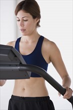 Woman training on treadmill. Photo: Rob Lewine